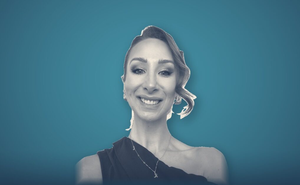 Beth Gowan, portrait on a teal background