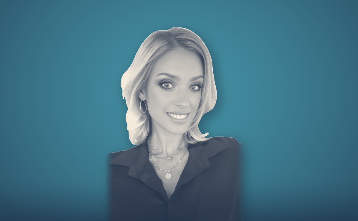 Hayley Draper, portrait on a teal background