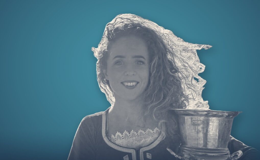 Rachael Walker, portrait on a teal background