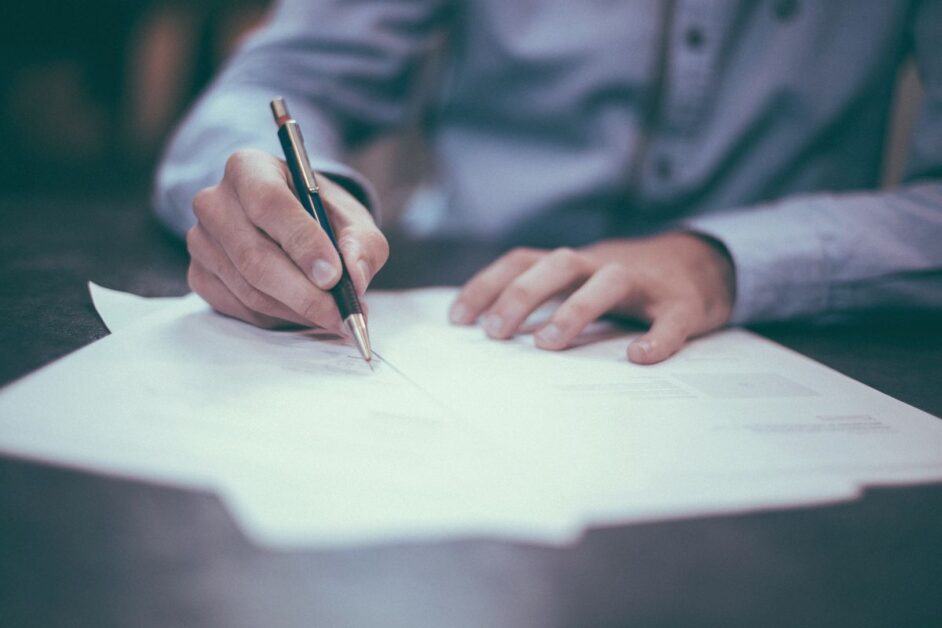 Employed or self-employed? Hiring your first dance teacher Hands signing a document with a pen, as you work out whether your first teacher is employed or self employed
